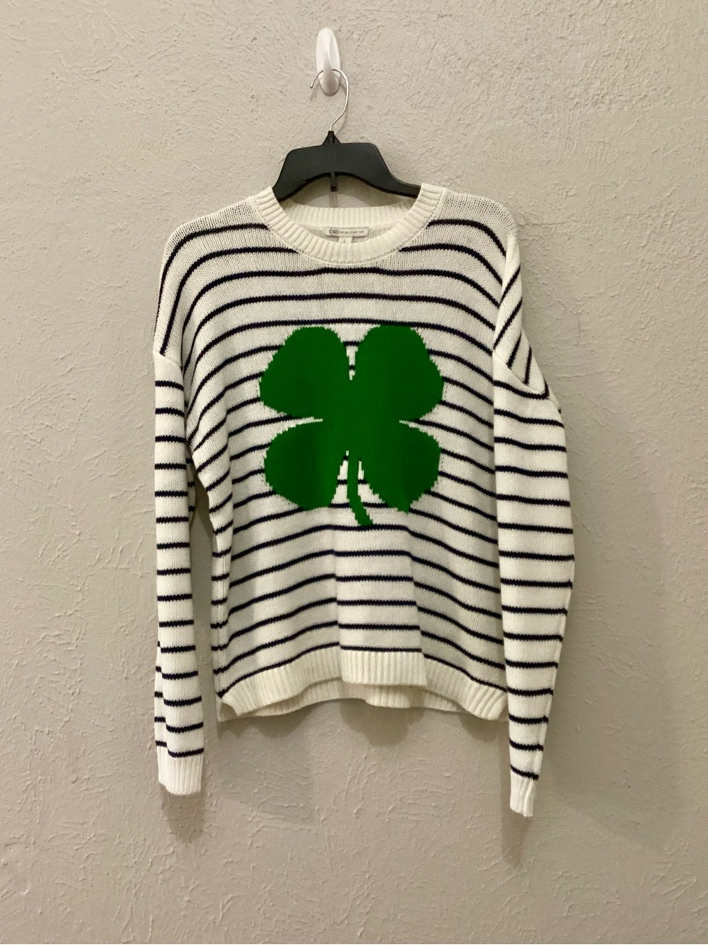 Cato Striped White & Black Sweater with Green Clover Motif